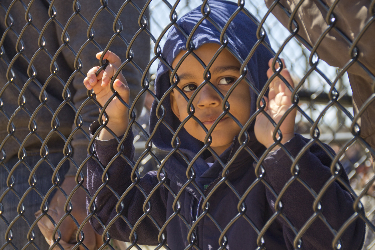 A young boy watches the festivities Saturday morning. (Credit: Paul Squire)