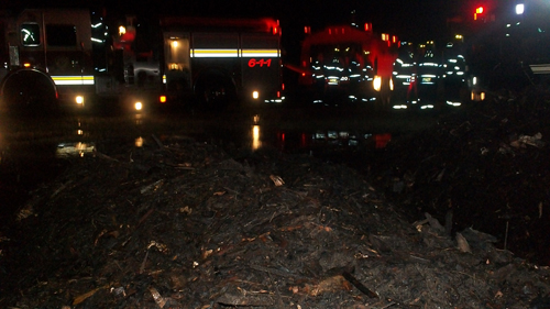 JAMESPORT FIRE DEPARTMENT COURTESY PHOTO | FIrefighters at the scene of Wednesday's mulch fire.