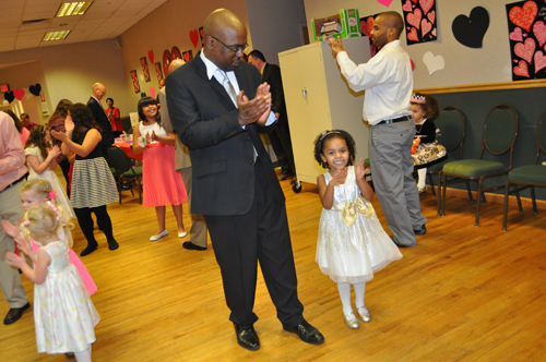James Richardson of Wading River with his 3-year-old daughter, Brynn, at Saturday's dance in Aquebogue. (Credit: Rachel Young photos)
