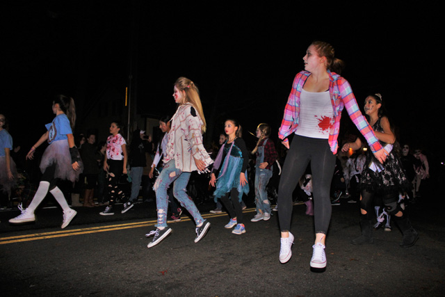 Redancers marching with their banner to present Thriller.