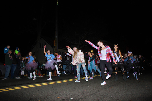 Redancers marching with their banner to present Thriller.