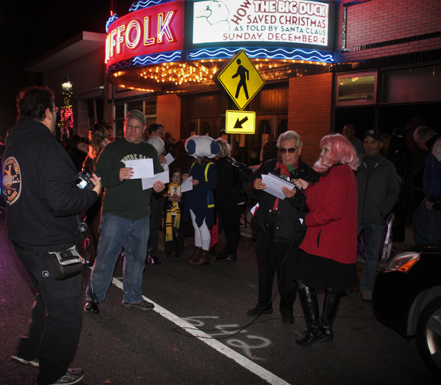 Winners of the pumpkin carving contest were announced after the parade – winners include Girl Scout Troop 220 and Mr. Reichel (pictured left in green Notre Dame shirt) who won two awards including best in show.