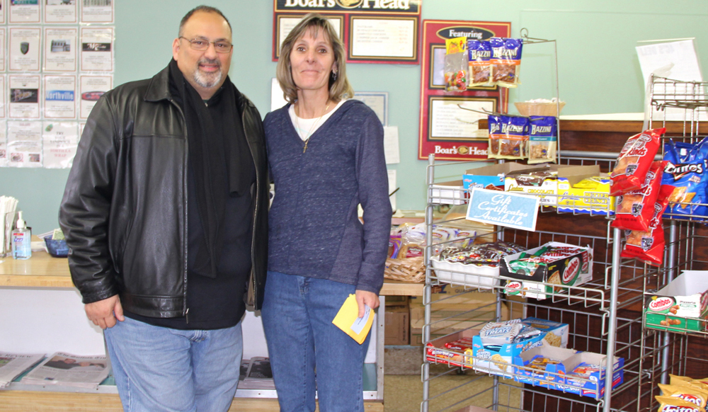 Anthony and Nadia Chiaramonte by the counter of their new business. (Credit: Carrie Miller)