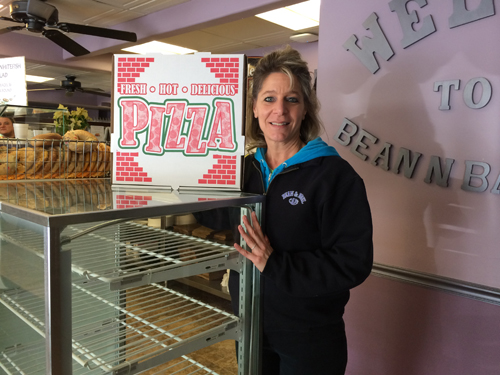 RACHEL YOUNG PHOTO | Bean and Bagel co-owner Joanne Leibold at the Calverton restaurant Wednesday morning.