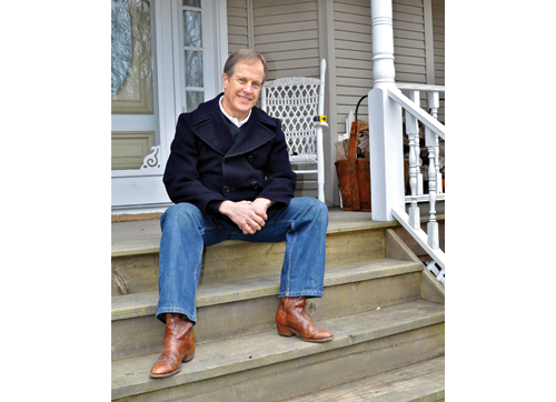 TIM KELLY PHOTO | Greg Blass on the front porch of his Jamesport home last week.