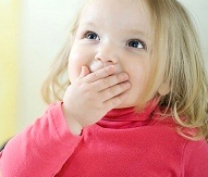 Blonde Toddler Girl Covering Mouth, Looking Up Stock Photos - Pictures - Photography - Royalty Free Images at Inmagine_1295348048225
