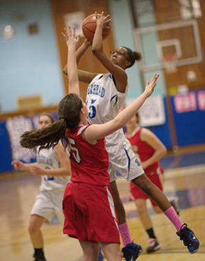 GARRET MEADE PHOTO | Riverhead freshman Dezare Brown goes up for a shot.