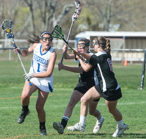 ROBERT O'ROURK PHOTO | Riverhead junior Carolyn Carrera scored five goals with a pair of assists in the Blue Waves' loss Tuesday to Patchogue-Medford.