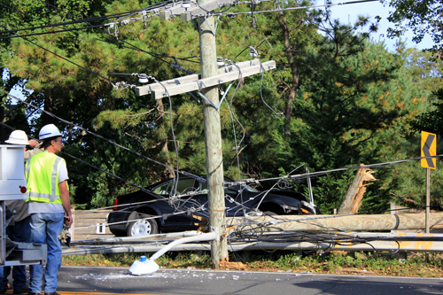 Photos: Portion of Main Road closed Sunday after car crashed into ...