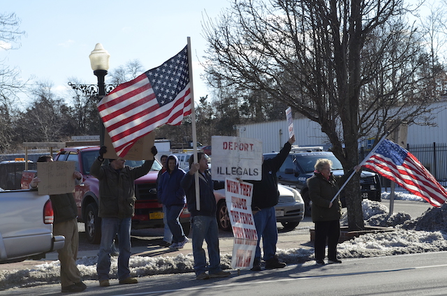 A small crowd of protesters appeared across the street from the march. 