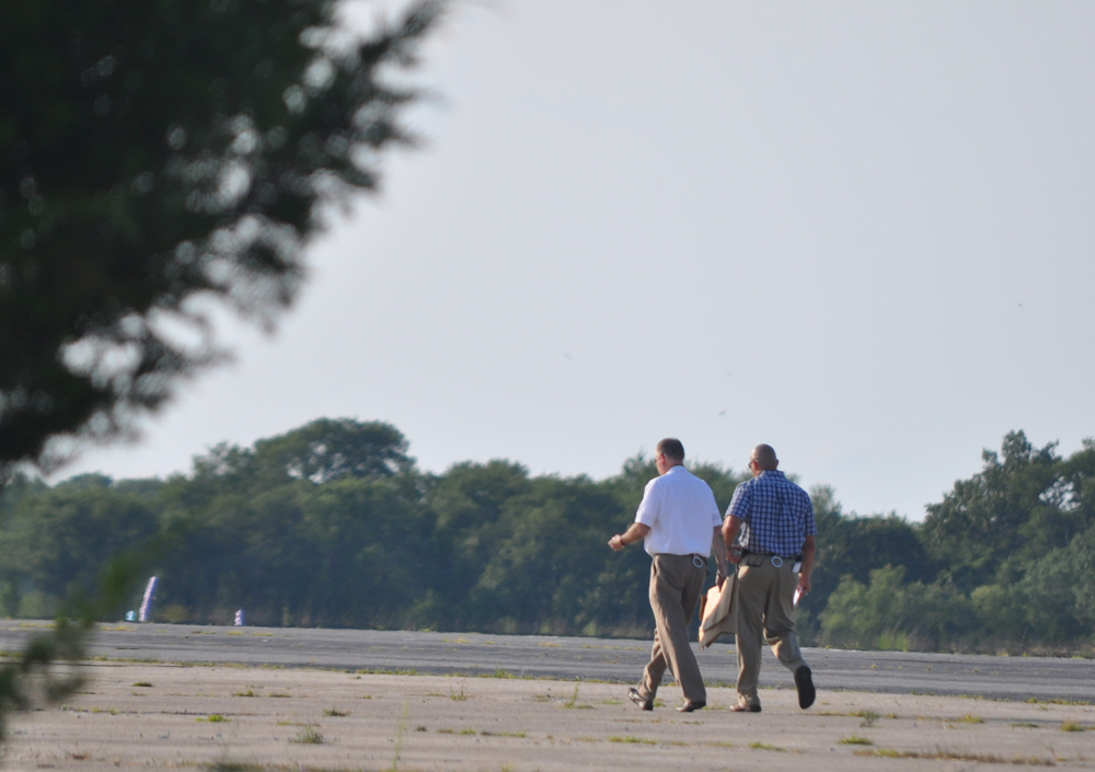 Investigators on the scene of the crash. (Credit: Grant Parpan)