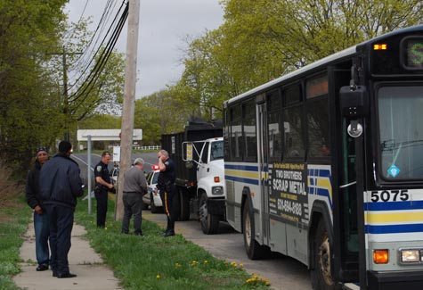Suffolk County bus collides with dump truck