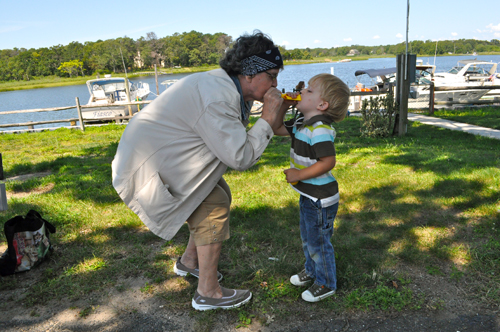 Theodora Hartman and her 3-year-old grandson Jethro Wallace, of Brooklyn got in the spirit with duck whistles. 