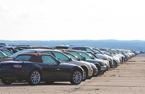 BARBARAELLEN KOCH PHOTO | Cars, trucks and SUV's parked on town-owned land at the eastern runway at the Calverton Enterprise Park. BARBARAELLEN KOCH PHOTO | Cars, trucks and SUV's parked on town-owned land at the eastern runway at the Calverton Enterprise Park.