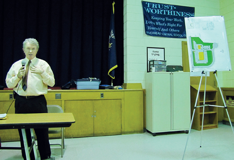 TIM GANNON PHOTO | Developer Paul Elliot discusses his building plans with Calverton civics Thursday night.
