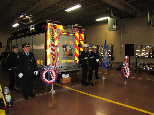 Chaplain Bob Bourguignon leads the annual Flanders Fire Department memorial service Sunday. Tim Gannon photo