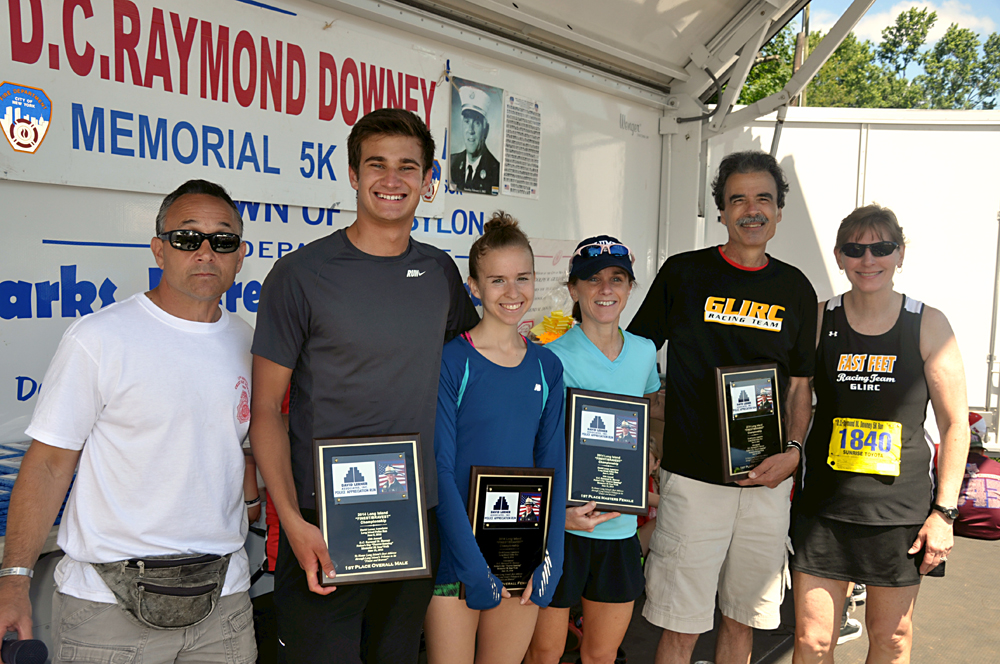 Finest and Bravest winner Travis Wooten (second from left) accepts his award Sunday (co