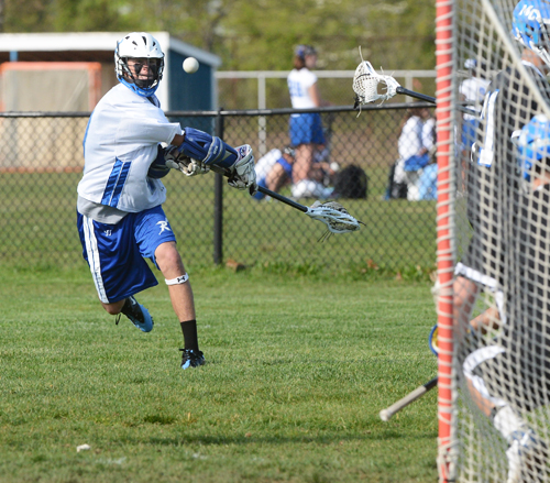 ROBERT O'ROURK PHOTO | Riverhead sophomore Ryan Hubbard fires a shot on goal against Middle Country Friday.