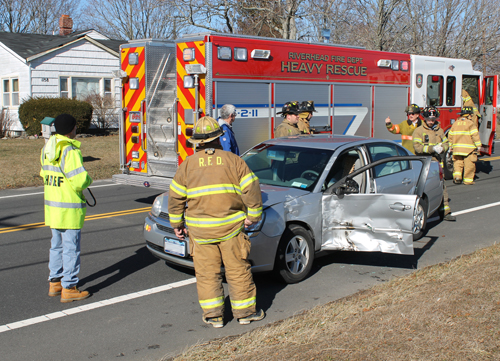PAUL SQUIRE PHOTO | Firefighters were called to extract a woman from a Doctors Path crash Thursday morning. A volunteer was able to free the victim without tools.