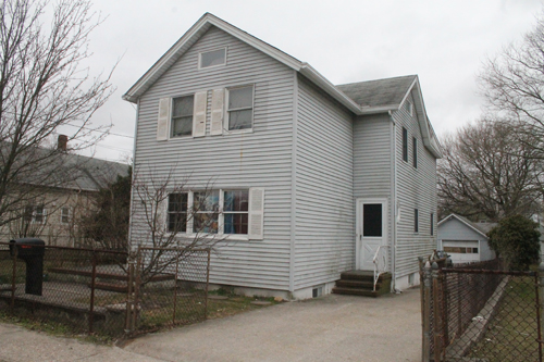 PAUL SQUIRE PHOTO | This property on Hamilton Avenue was raided by town code enforcement officials Friday morning. 
