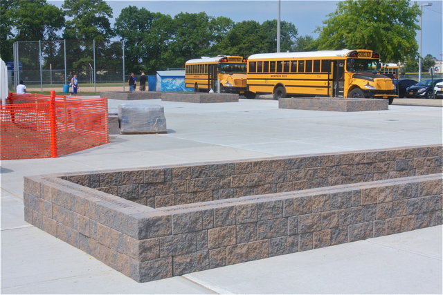 Planters in the new courtyard in the back of the school will be planted with trees.