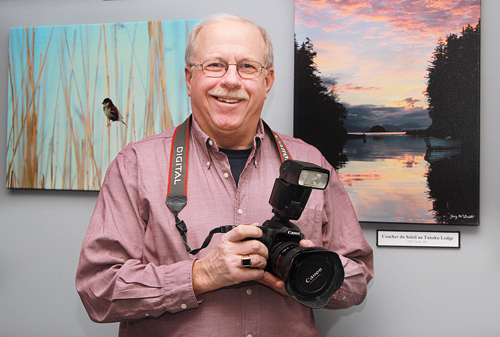 JENNIFER GUSTAVSON PHOTO | Retired teacher Jerry McGrath at The Grind Cafe in Wading River, where his works have been on display all month.