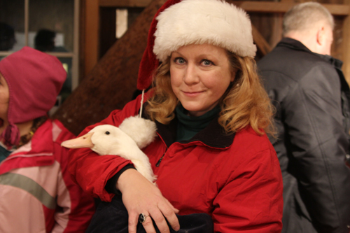 Lisa Dabrowski, co-curator of the Long Island Duck Farming Exhibit, with Roxy at Wednesday night's event. (Credit: Jen Nuzzo photos)