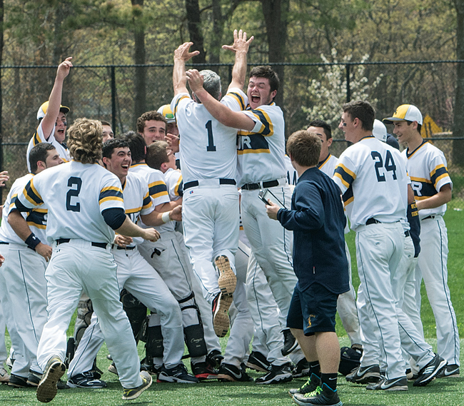 Sal Mignano goes airborne during a celebration in May after the Wildcats clinched the League VII championship. (Credit: Robert O'Rourk, file)
