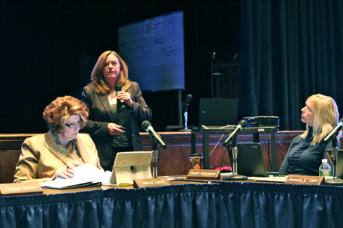 Riverhead School District Superintendent Nancy Carney, center, at Tuesday night's school board meeting. (Credit: Jennifer Gustavson)