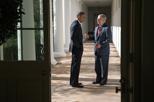 President Barack Obama talks with Senate Minority Leader Mitch McConnell, R-Ky., on the Colonnade of the White House, Nov. 7, 2014. (Official White House Photo by Pete Souza)