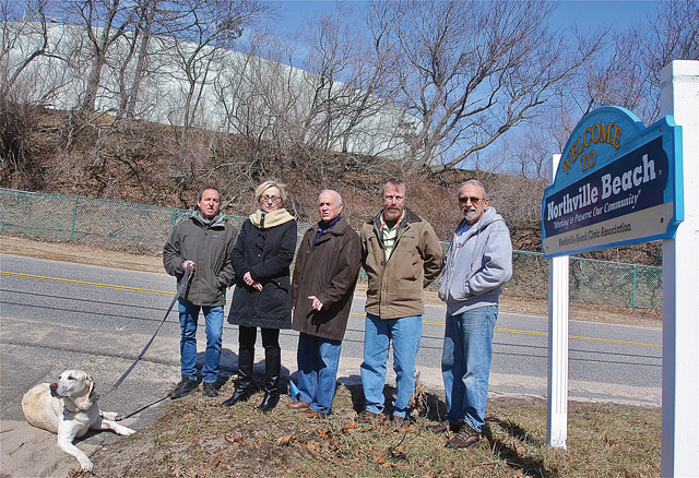 Opponents of the Riverhead Terminal expansion on Sound Shore Road Monday afternoon (from left): Northville Beach Civic Association president Neil Krupnick, Ann Weiser, Greg Genovese of the Highlands Club community, John Cullen and Dave Gruner. (Credit: Barbaraellen Koch)