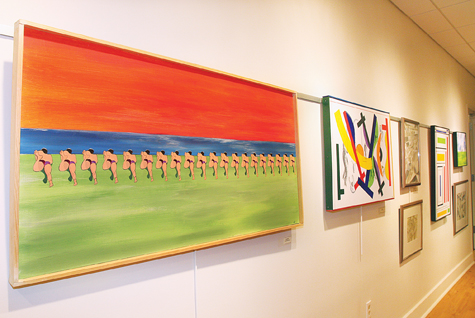 Work by Salvatore Gentile ('The Swimming Lesson' in foreground) is on view at Riverhead Free Library's Elizabeth Fox Overton gallery.