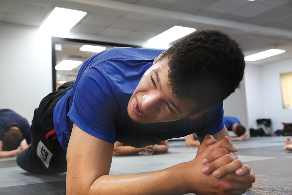PAUL SQUIRE PHOTO | Elvio Estrada powers through an hour-long workout during his training sessions last Thursday. He has one month to prepare for the world championship tournament.