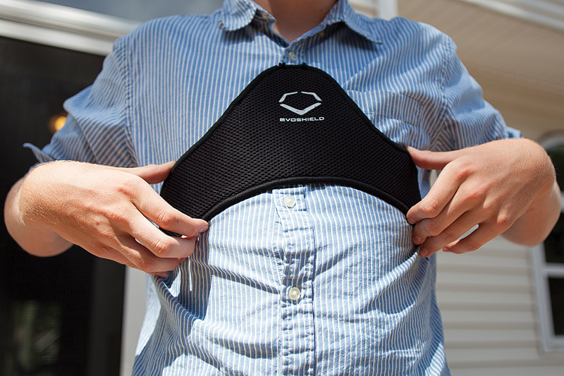 Jack Crowley shows off the device he now wears to protect his heart while playing sports. (Credit: Chris Lisinski)