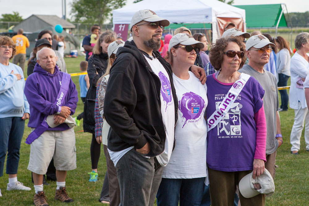 Survivors and their families watch the presentation. (Credit: Katharine Schroeder)