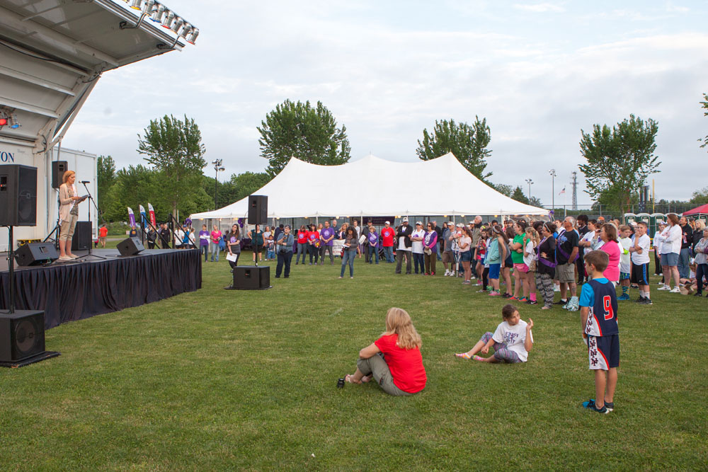Cathy Russo of Mattituck tells her survivor story to the crowd. (Credit: Katharine Schroder)