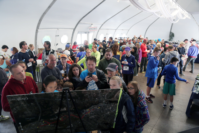 Runners check their times and enjoy refreshments after the 5K Saturday morning. (Credit: Krysten Massa)