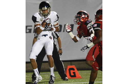 Shoreham-Wading River wide receiver Isreal Squires pulled in a pass for a touchdown that gave Long Island a 34-14 lead with 5 minutes 45 seconds to go. (Credit: Robert O'Rourk).