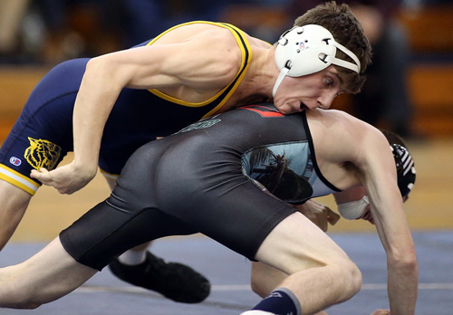 Jack Del Duca was a winner for Shoreham-Wading River at 113 pounds, defeating Westhampton Beach's Casey Hughes, 7-2. (Credit: Garret Meade)