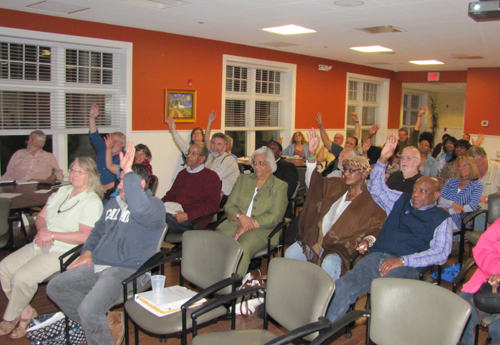 A show of hands on Monday night for 'Riverside Rediscovered,' the name of the project to revitalize the hamlet. (Credit: Tim Gannon)
