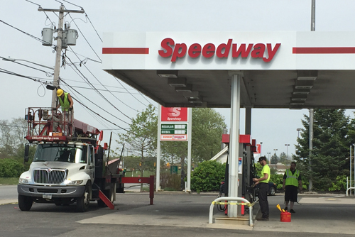 Signage at Speedway by the Tanger Outlets was being changed over on Friday. (Credit: Paul Squire)