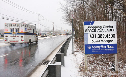 BARBARAELLEN KOCH PHOTO | Vacant land is fast disappearing on Route 58. Irwin Garsten owns the above piece of property, just east of the Hudson Savings Bank building, where he has a site plan application for a shopping center.