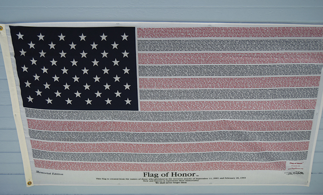 The flag is displayed on the ceiling in Mr. Brickman's Jamesport cottage. (Credit: Joe Werkmeister)