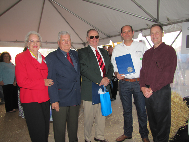 Tebbens Steel at EPCAL celebrated its 70th anniversary Sept. 19. Elsie Tebbens, Councilman John Dunleavy, Tom Tebbens Sr, Tom Tebbens II, and Riverhead Supervisor Sean Walter celebrated the milestone. (Credit: Tim Gannon)