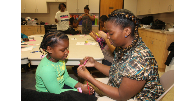 Tijuana Fulford with her daughter, Alexandria, 6, at last week’s The Butterfly Effect Project meeting. (Credit: Barbaraellen Koch photos)
