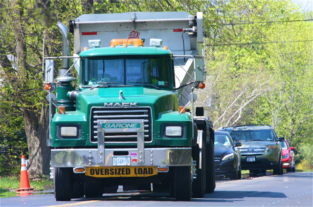 A truck with an oversized load on Main Road in East Marion. (Credit: Barbaraellen Koch)