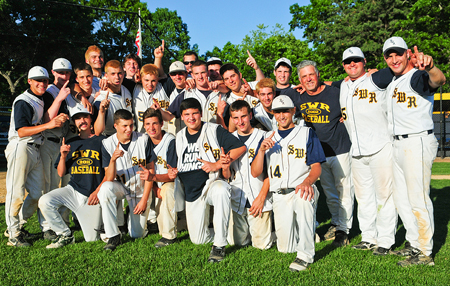 BILL LANDON PHOTO | The Shoreham-Wading River baseball team won a wild extra inning game against Sayville for its first county title since 2002.