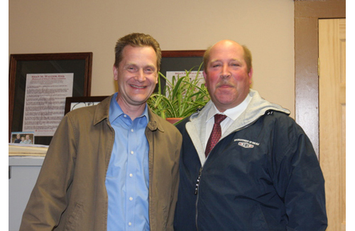 Supervisor Sean Walter and Councilman James Wooten smiled and posed for photos after a meeting in 2011. (Credit: Barbaraellen Koch file)