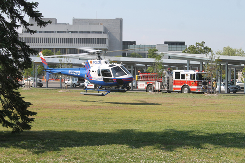 PAUL SQUIRE PHOTO | A Suffolk County helicopter lands near the county center in Riverside Tuesday afternoon.