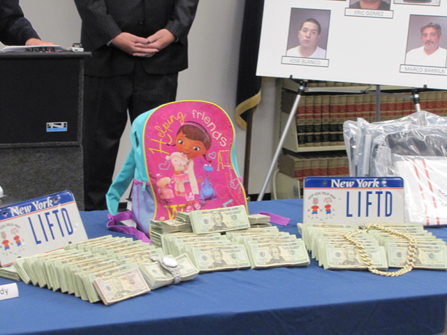 A backpack discovered by police had been filled with money. (Credit: Tim Gannon)